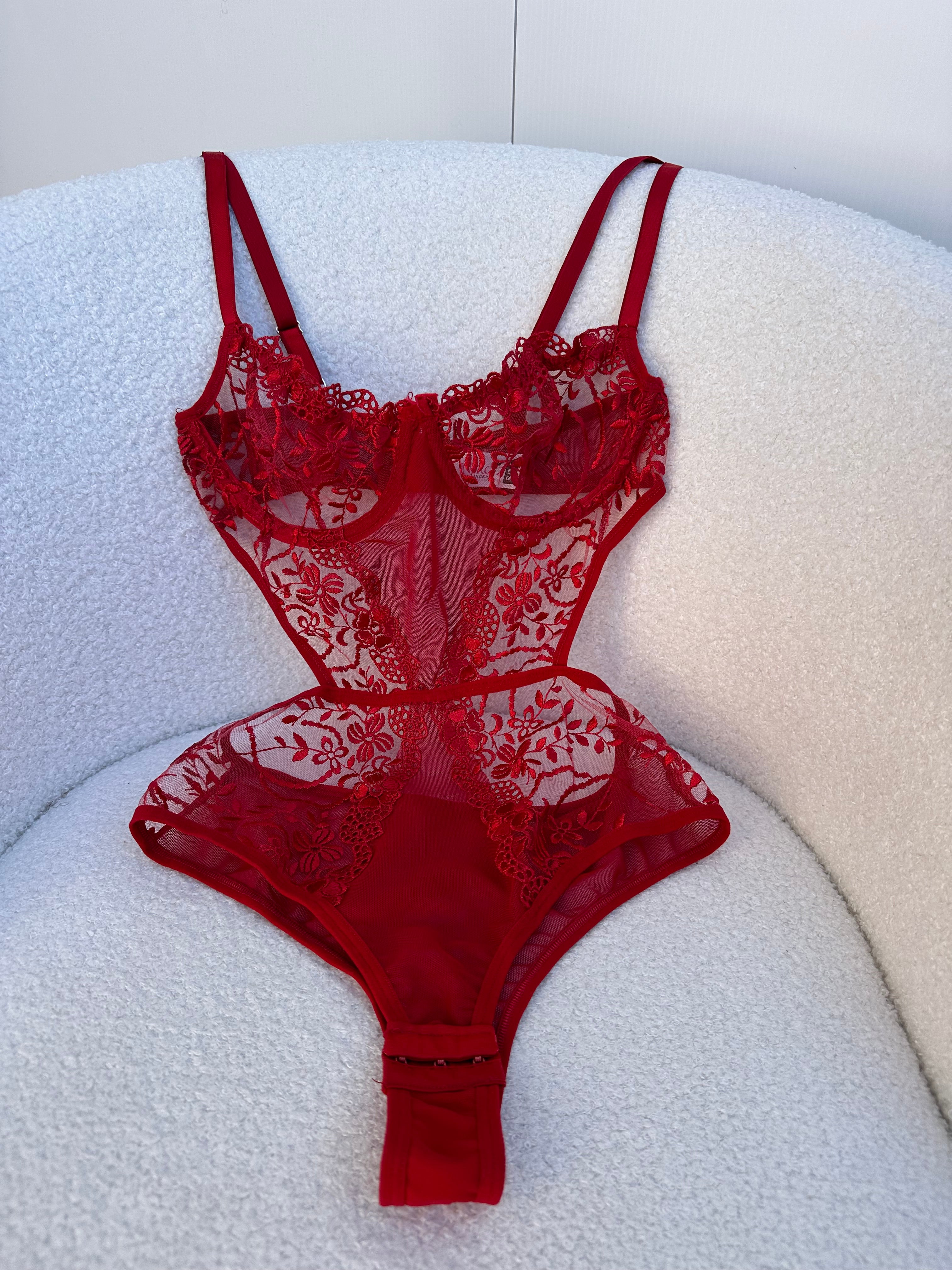 Tiana Lace Bodysuit wraps you in bold floral lace and confidence